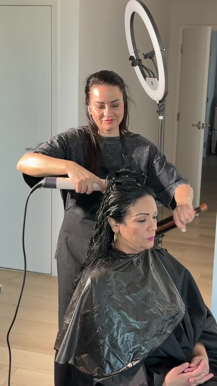 Hair drying and brush styling during a hair-care appointment